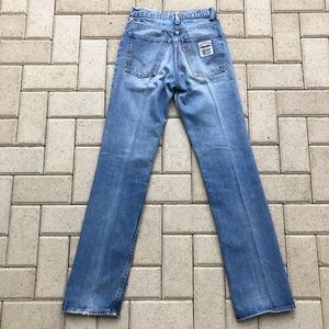 Vintage high-waisted orange tag Levi’s